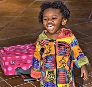 ”I love the color of this suitcase it goes with my clothes.” Photo by Michael Gordon