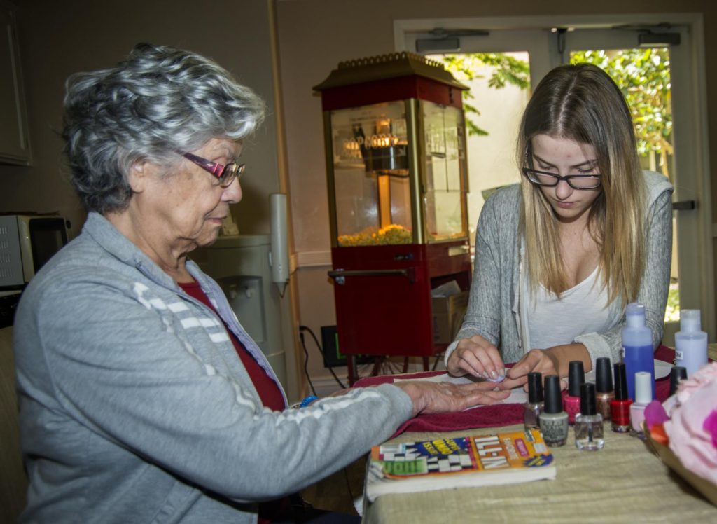 Aurora Castanon getting her nails done by Bailey Camp,