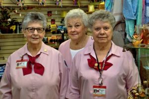 Long time volunteers Doris , Ginny , and Judy  in the CMH Auxiliary Gift Shop.  Not shown is volunteer Pat Utter. Photo by Michael Gordon