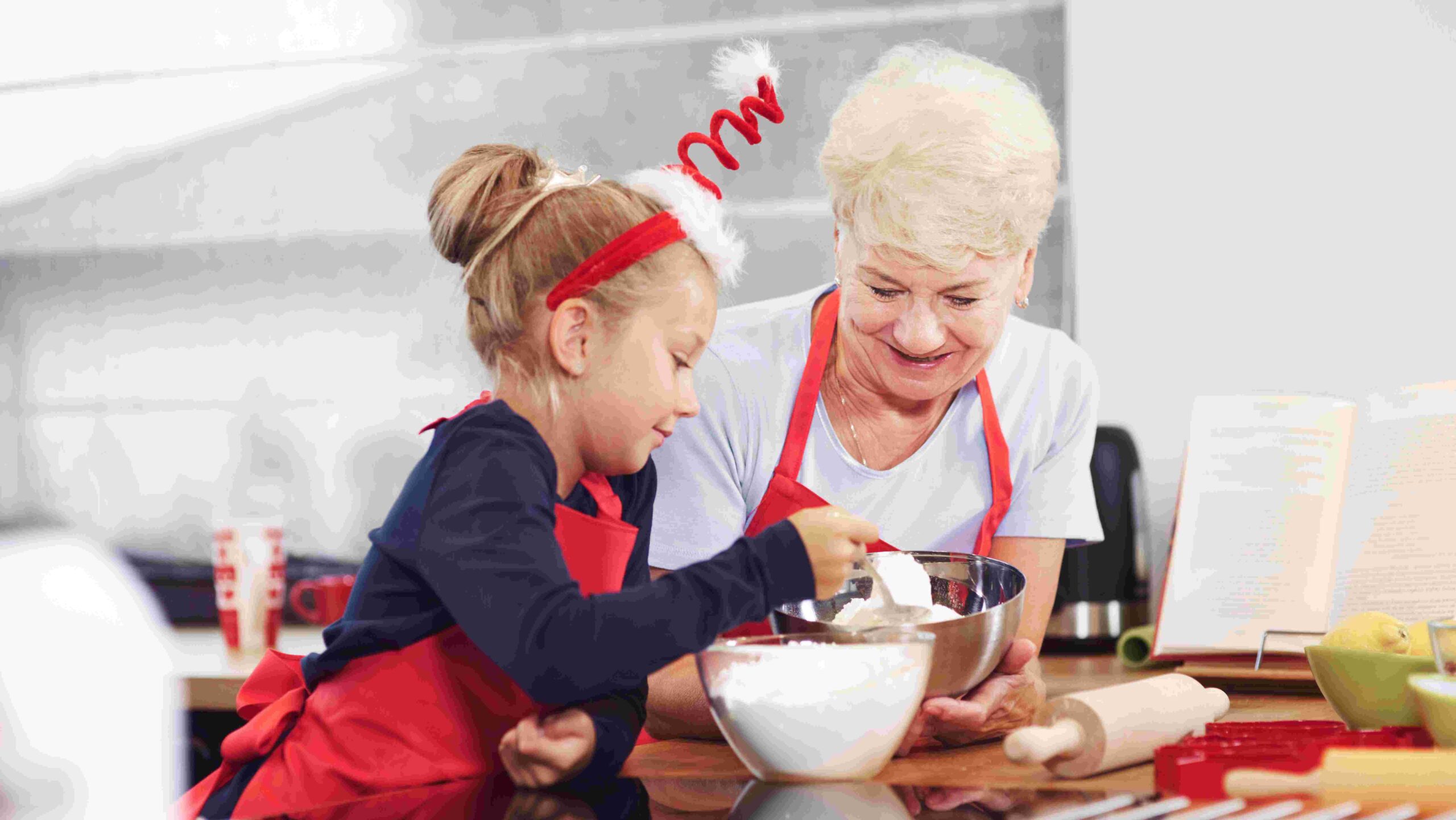 Grandma with granddaughter cooking