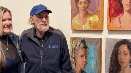 Photo of Artist Johanna Spinks and retired Breeze Publisher Sheldon Brown .