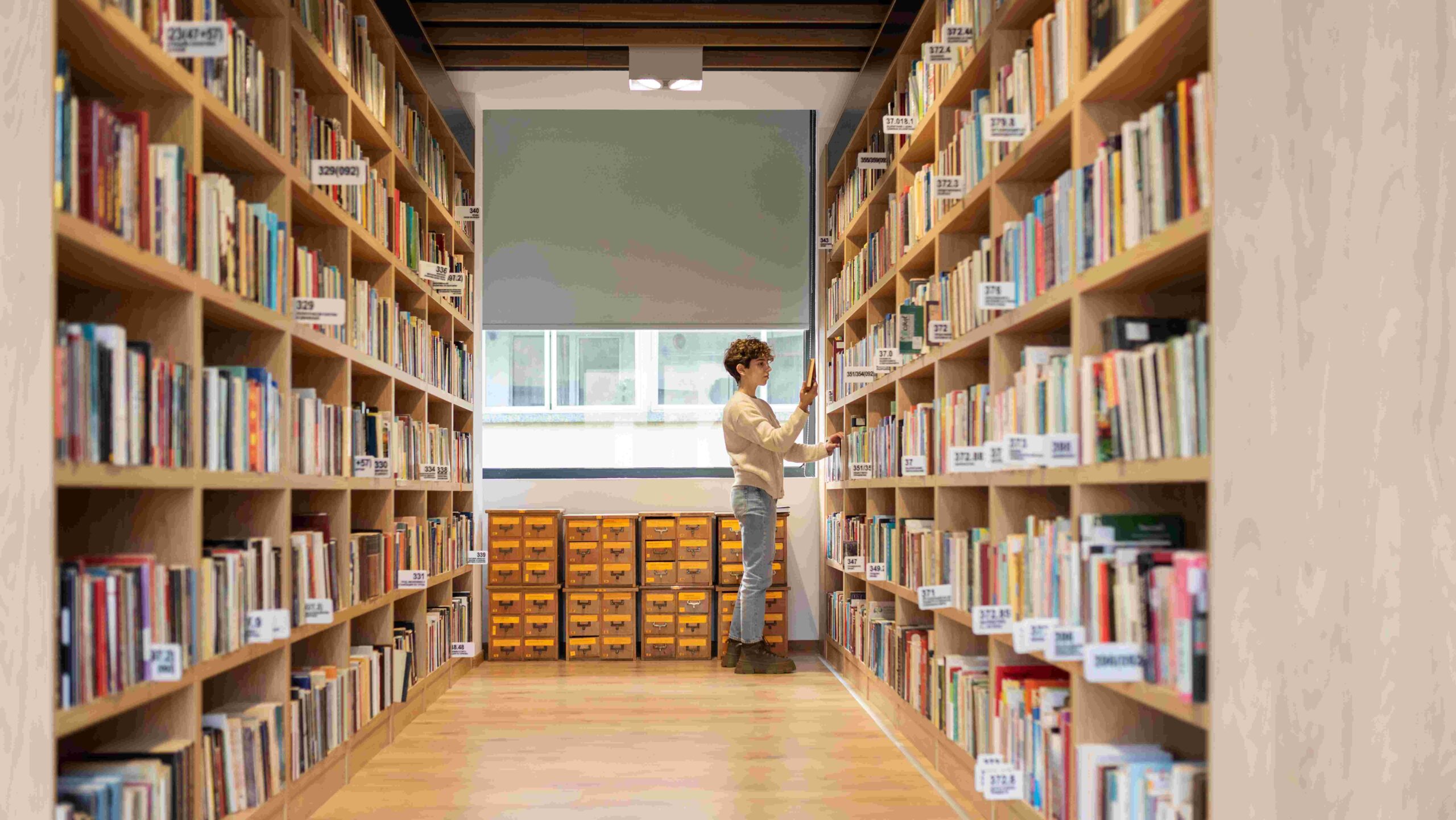 young person at library