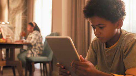 Child looking at digital screen