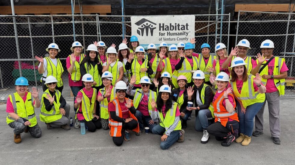 Photo of Bank of America volunteers gather to help construct new homes for local Camarillo families at the Habitat for Humanity of Ventura County annual Women Build.