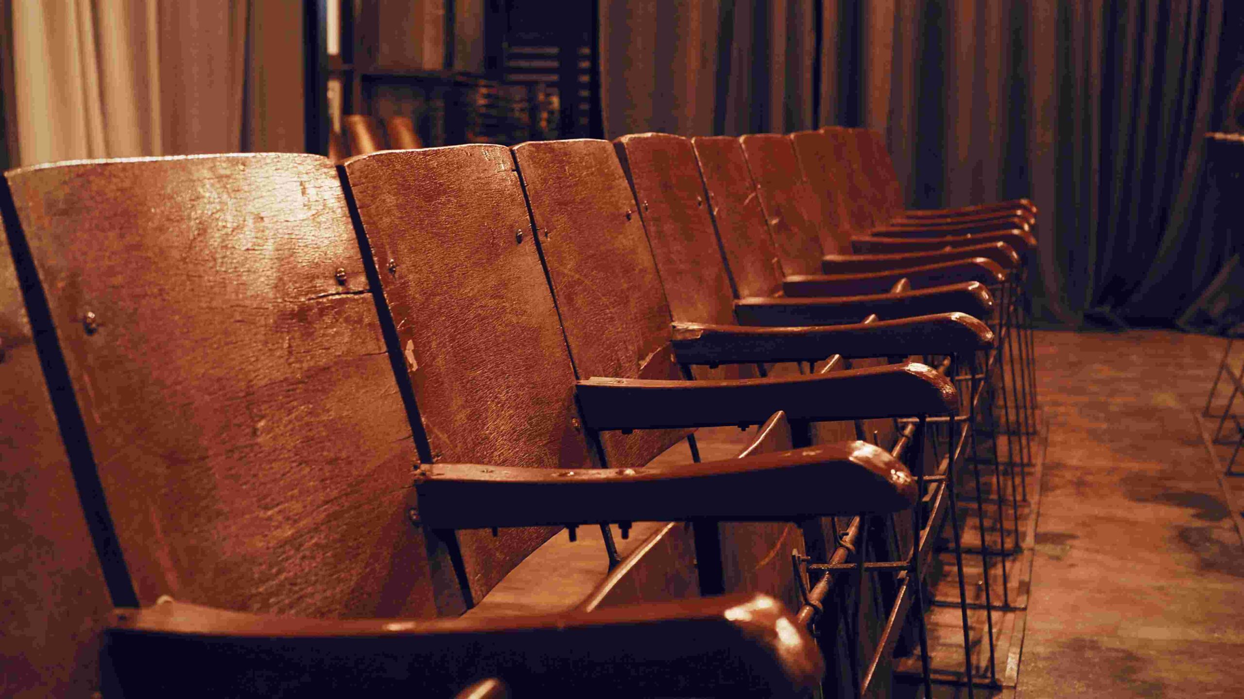 Empty row of theatre chairs