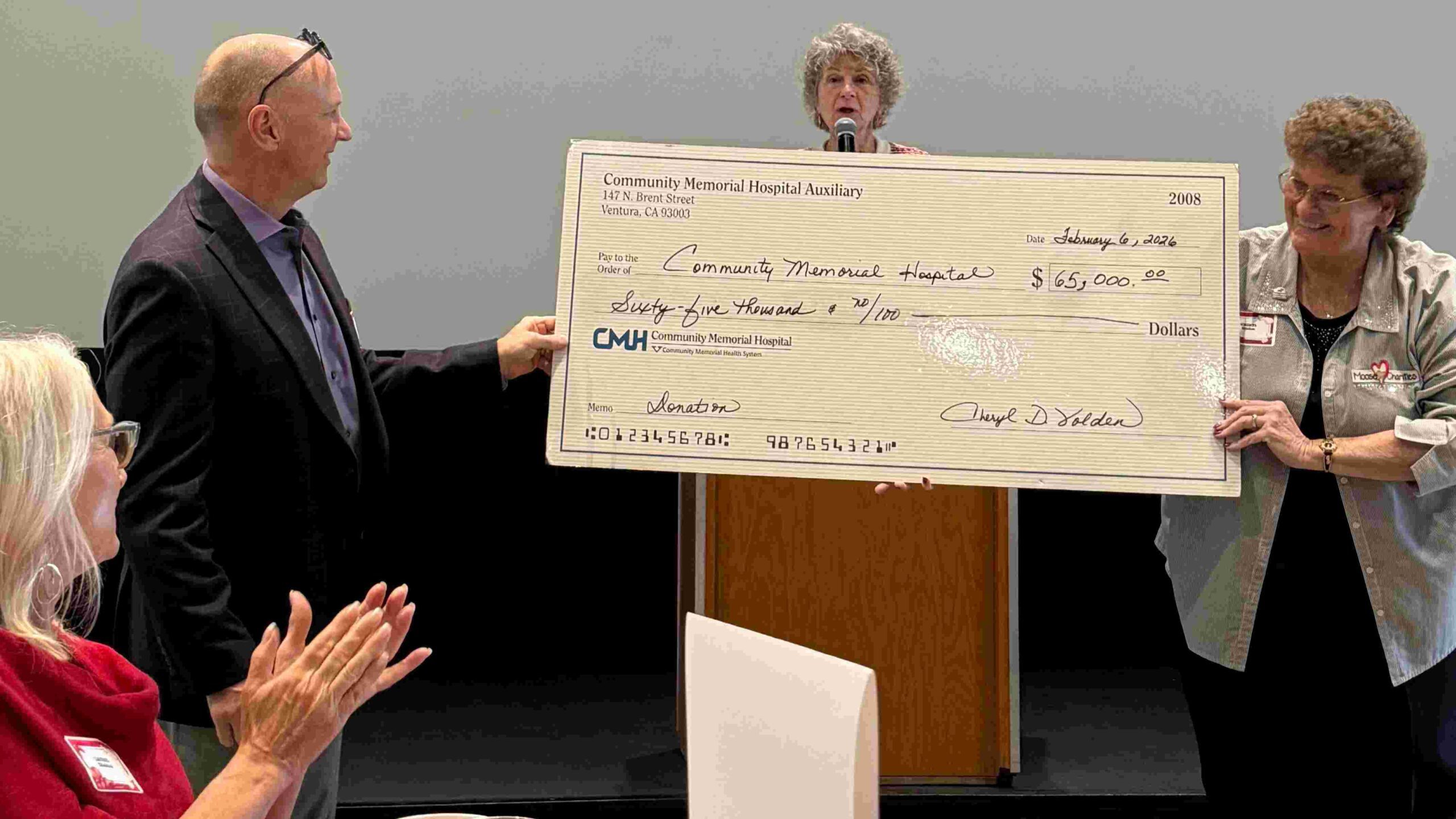 Cheryl Volden gives large paycheck to Mick Zdeblick