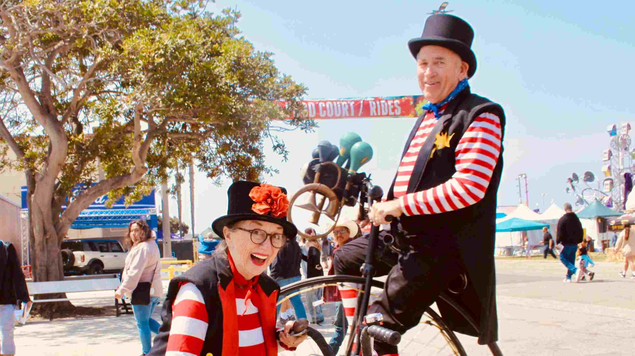 People dressing up in Strawberry Festival themed clothing