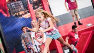 Girl navigating obstacle course