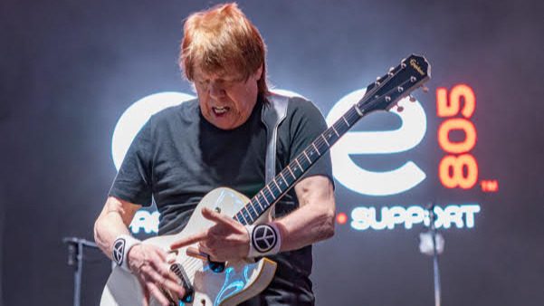 george Thourougood playing guitar